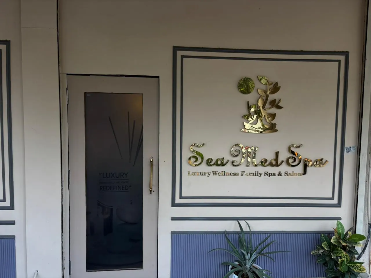 The lit Sea Med Spa signage at the Sector 7 entrance